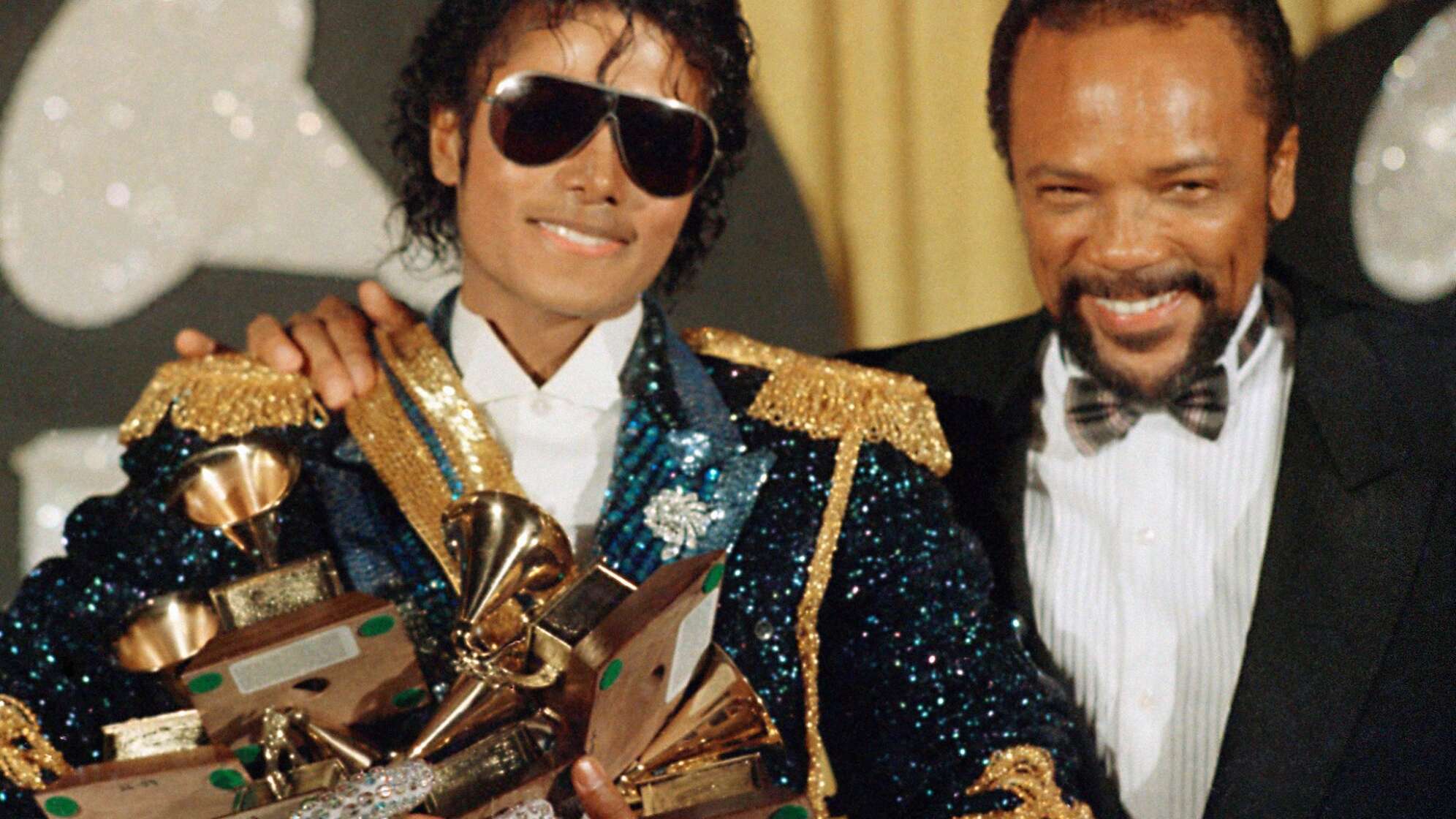 Michael Jackson (l) und US-Musikproduzent Quincy Jones